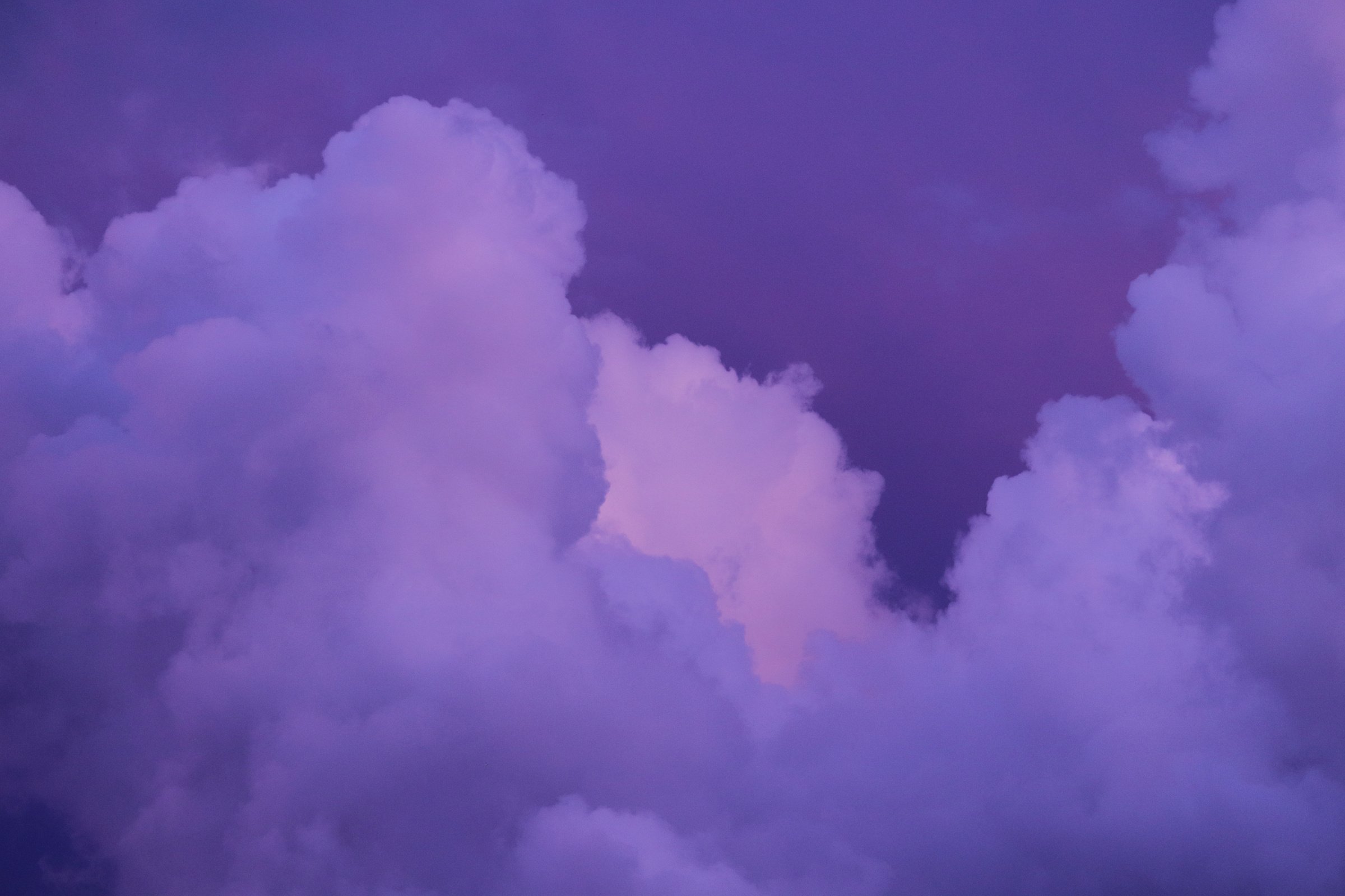 Authentic purple fluffy clouds